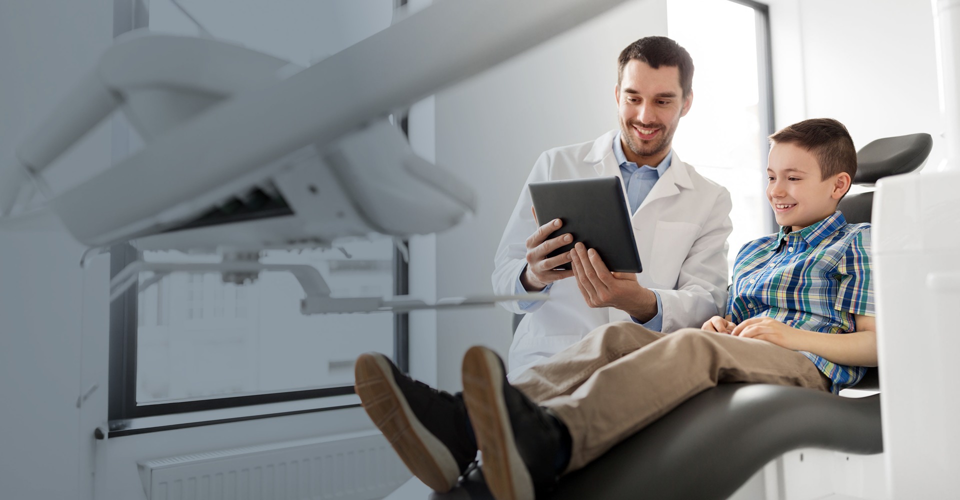 Dentist and patient at clinic