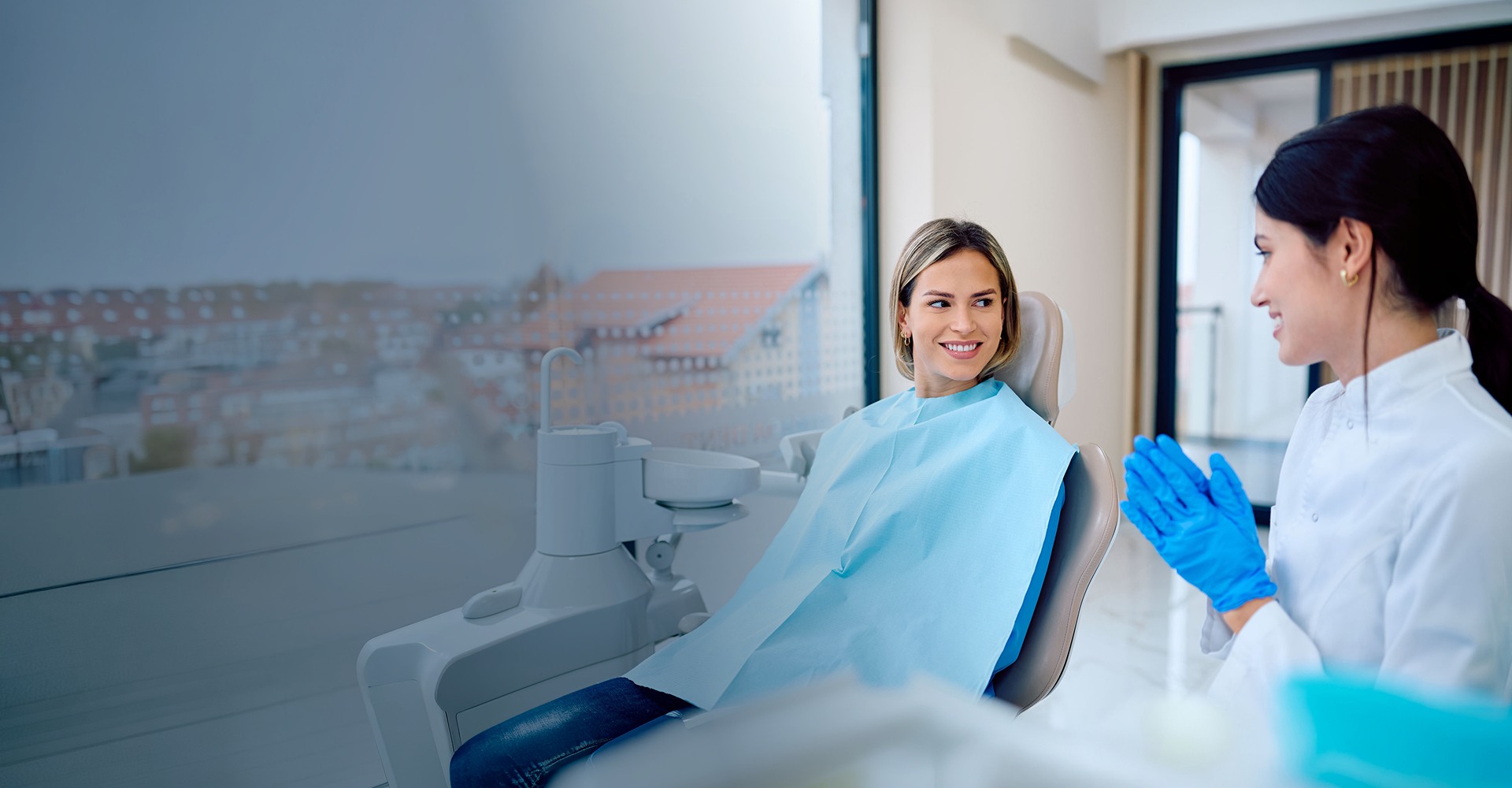 Patient talking dentist clinic