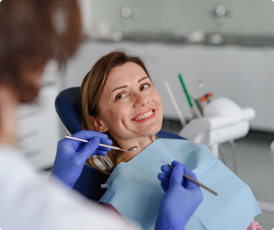 Woman dentist clinical treatment