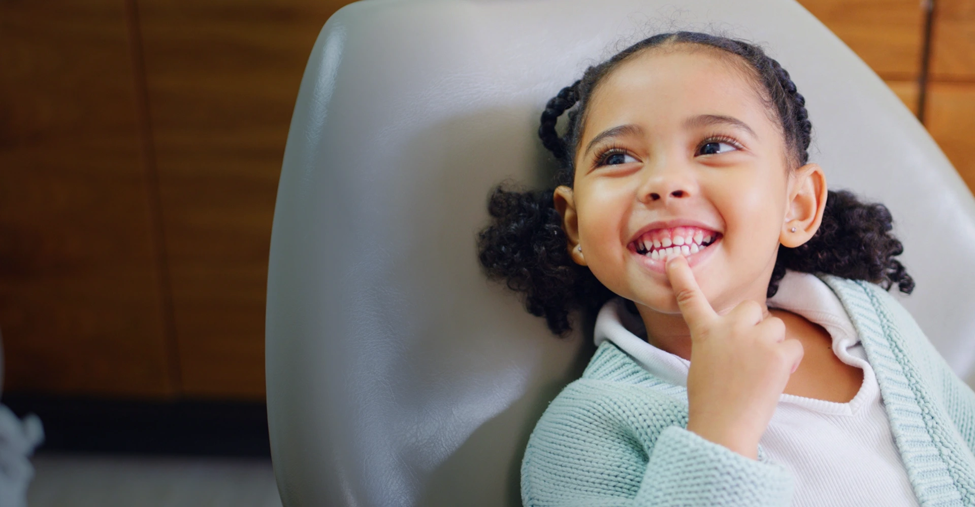 Young girl smiling dental clinic